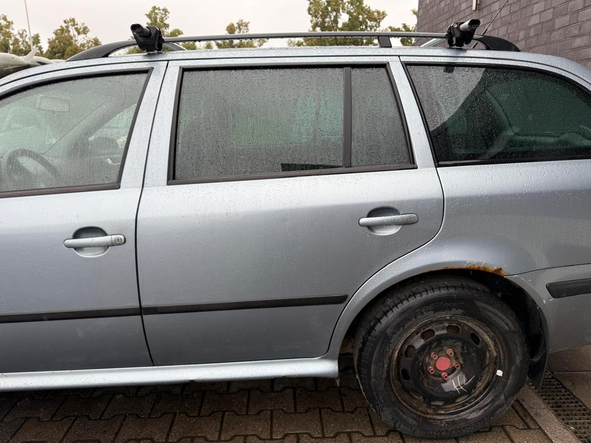 Skoda Octavia 1U original Tür hinten links LF7U Stonegrey Kombi Rohbau BJ03
